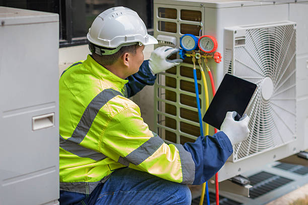 Professional Heat Pump Repair technician working in Munster, IN